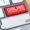 A keyboard with a red button